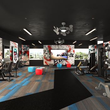 a rendering of a fitness room with a tv and exercise equipment  at Track 281 Apartments, California, 95811